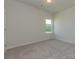 Spacious bedroom with a window offering natural light and neutral wall colors at 2238 Catawba Trace Dr, Catawba, NC 28609