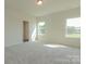 Spacious bedroom with carpeted floors and large windows at 2238 Catawba Trace Dr, Catawba, NC 28609