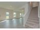 Spacious Gathering room with vinyl plank flooring and door leading to backyard at 2238 Catawba Trace Dr, Catawba, NC 28609