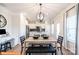 Open concept dining area with kitchen view and modern light fixture at 2246 Catawba Trace Dr, Catawba, NC 28609