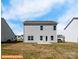 Rear view of two-story house showcasing backyard and patio at 2246 Catawba Trace Dr, Catawba, NC 28609