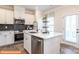 Modern kitchen with white cabinets, stainless steel appliances, and an island at 2246 Catawba Trace Dr, Catawba, NC 28609