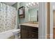 Clean bathroom with shower/tub combo, vanity, and linen storage at 232 14Th Se Ave # E, Hickory, NC 28502