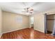 Bedroom with ceiling fan, hardwood floors, and access to bathroom at 232 14Th Se Ave # E, Hickory, NC 28502