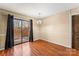 Dining area with hardwood floors and sliding door to patio at 232 14Th Se Ave # E, Hickory, NC 28502