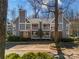 Condo community with exterior accents and landscaping for a refined residential experience in a wooded area at 2502 Cranbrook Ln # 4, Charlotte, NC 28207