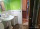 Bathroom with pedestal sink and a separate shower at 2518 Cove Creek Dr, Gastonia, NC 28056