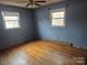 Bedroom with light blue walls and wood floors at 2518 Cove Creek Dr, Gastonia, NC 28056