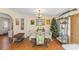 Bright dining area with a square table and decorative shelving at 2590 Pierson St, Newton, NC 28658