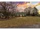 Charming house with well-manicured lawn and sunset view at 2590 Pierson St, Newton, NC 28658