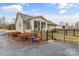 House exterior with sunroom and landscaping at 2590 Pierson St, Newton, NC 28658