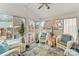 Relaxing sunroom with wicker furniture and garden views at 2590 Pierson St, Newton, NC 28658