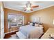 Cozy bedroom with neutral tones, a ceiling fan, and ample natural light at 2706 White Pines Ct, Monroe, NC 28112