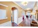 Bright and spacious entryway with hardwood floors and arched doorways at 2706 White Pines Ct, Monroe, NC 28112