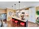 Modern kitchen with granite island and stainless steel appliances at 2706 White Pines Ct, Monroe, NC 28112