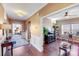 Open living room features hardwood floors and built-in shelving at 2706 White Pines Ct, Monroe, NC 28112