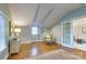 Bright bedroom with hardwood floors and access to another room at 2912 Park Rd, Charlotte, NC 28209