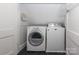 Convenient laundry room with washer and dryer at 2912 Park Rd, Charlotte, NC 28209