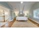 Spacious primary bedroom with vaulted ceilings and natural light at 2912 Park Rd, Charlotte, NC 28209