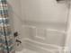 Clean bathroom with a bathtub and shower at 306 Union St, Maiden, NC 28650