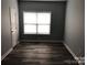 Empty bedroom with gray walls and wood-look floors at 306 Union St, Maiden, NC 28650