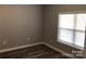 Simple bedroom with gray walls and wood-look floors at 306 Union St, Maiden, NC 28650