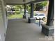 Inviting front porch with gray flooring and white railings at 306 Union St, Maiden, NC 28650