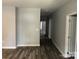 Spacious hallway with light gray walls and wood-look floors at 306 Union St, Maiden, NC 28650