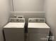 Stackable washer and dryer in a convenient laundry room at 306 Union St, Maiden, NC 28650