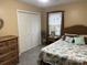 Bedroom with white closet doors and seashell bedding at 3165 Wimbledon Ln, Rock Hill, SC 29732