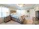 Main bedroom with carpeted floors, ceiling fan, and ensuite bathroom access at 3165 Wimbledon Ln, Rock Hill, SC 29732