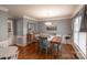 Dining room with hardwood floors, light gray walls, and a wooden table at 3165 Wimbledon Ln, Rock Hill, SC 29732