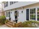 Inviting front entrance with brick steps and black door at 3165 Wimbledon Ln, Rock Hill, SC 29732