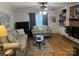 Living room with hardwood floors, fireplace, and comfortable seating at 3165 Wimbledon Ln, Rock Hill, SC 29732