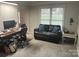 Home office with leather couch and desk at 3165 Wimbledon Ln, Rock Hill, SC 29732