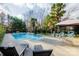 Relaxing pool area with lounge chairs and patio at 3165 Wimbledon Ln, Rock Hill, SC 29732