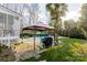 Brick patio with grill and lounge chairs near pool at 3165 Wimbledon Ln, Rock Hill, SC 29732