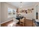 Bright dining room featuring a black table, neutral walls, and a basket wall decor at 4119 Flint Dr, Lancaster, SC 29720