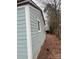 Side view of the house showcasing light blue siding at 415 Sherman St, Gastonia, NC 28052