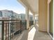 Balcony overlooking city views with metal railings at 4620 Piedmont Row Dr # 608, Charlotte, NC 28210