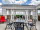 Rooftop patio with pergola, seating, and city views at 4620 Piedmont Row Dr # 608, Charlotte, NC 28210