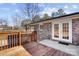 Wooden deck with brick house exterior and French doors at 4804 Chapel Grove Rd, Gastonia, NC 28052