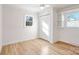 Well-lit bedroom with hardwood floors, built-in shelves and window at 4804 Chapel Grove Rd, Gastonia, NC 28052