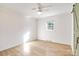 Spacious bedroom featuring hardwood floors and a window at 4804 Chapel Grove Rd, Gastonia, NC 28052