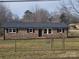 Brick ranch home with a spacious yard and new windows at 4804 Chapel Grove Rd, Gastonia, NC 28052