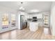 Modern kitchen with stainless steel appliances and light wood floors at 4804 Chapel Grove Rd, Gastonia, NC 28052