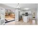 Modern kitchen with white cabinets, stainless steel appliances, and an island at 4804 Chapel Grove Rd, Gastonia, NC 28052