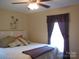 Spacious bedroom with a king-size bed and large window at 4819 Vander Ln # 54, Monroe, NC 28110