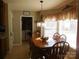 Kitchen dining area with wood table, chairs, and window seating at 4819 Vander Ln # 54, Monroe, NC 28110