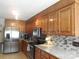 Kitchen with stainless steel appliances and granite countertops at 4819 Vander Ln # 54, Monroe, NC 28110